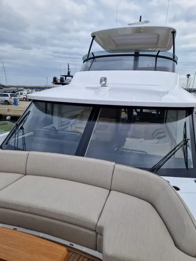  Yacht Photos Pics 2025 Azimut Magellano 60 yacht with sleek design and spacious deck.