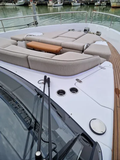  Yacht Photos Pics 2025 Azimut Magellano 60 yacht deck with luxurious seating and sleek design.