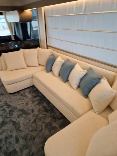  Yacht Photos Pics Luxurious interior of 2025 Azimut Magellano 60 yacht with plush seating and elegant decor.