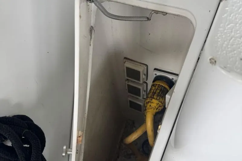  Yacht Photos Pics Electrical compartment of 1998 Carver 405 Motor Yacht with yellow power cable.