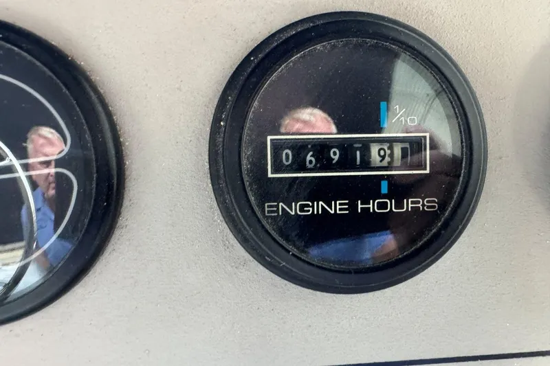  Yacht Photos Pics Close-up of 1998 Carver 405 Motor Yacht engine hour meter showing 691.9 hours.