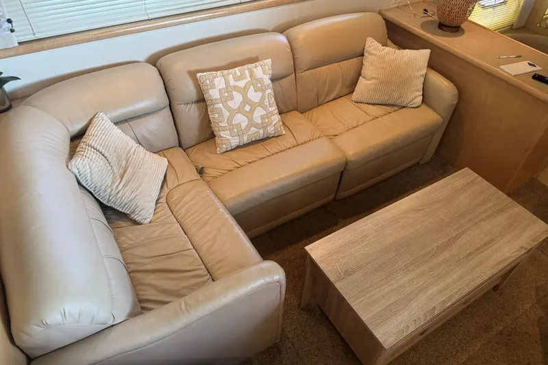  Yacht Photos Pics Luxurious beige leather seating area inside a 1998 Carver 405 Motor Yacht.
