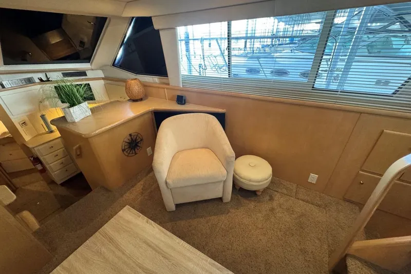  Yacht Photos Pics Luxurious interior of 1998 Carver 405 Motor Yacht with plush seating and elegant decor.