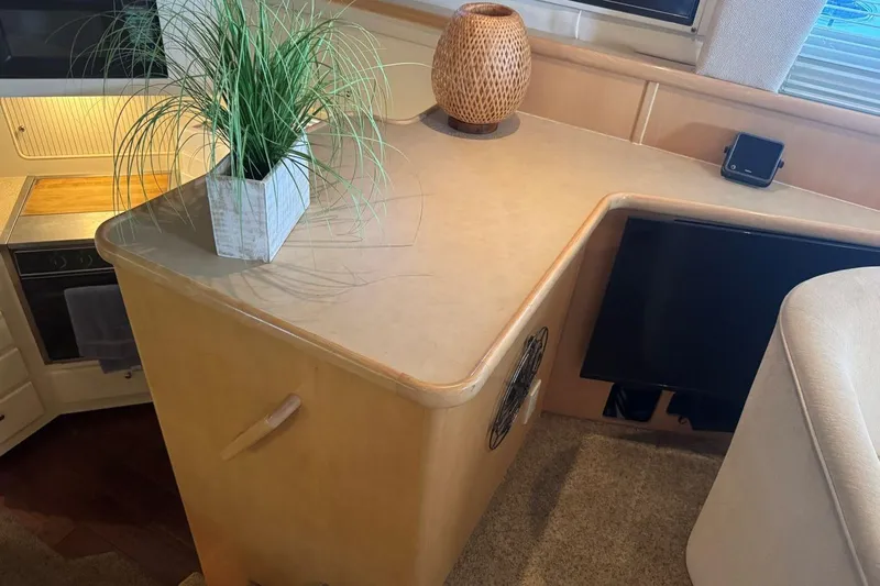  Yacht Photos Pics Interior of 1998 Carver 405 Motor Yacht with countertop, plant, and decor.