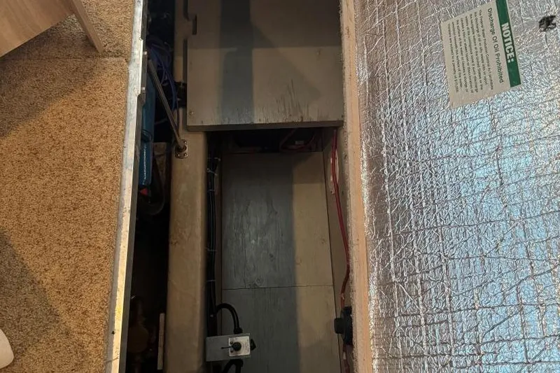  Yacht Photos Pics Engine compartment of a 1998 Carver 405 Motor Yacht, featuring insulation and wiring.