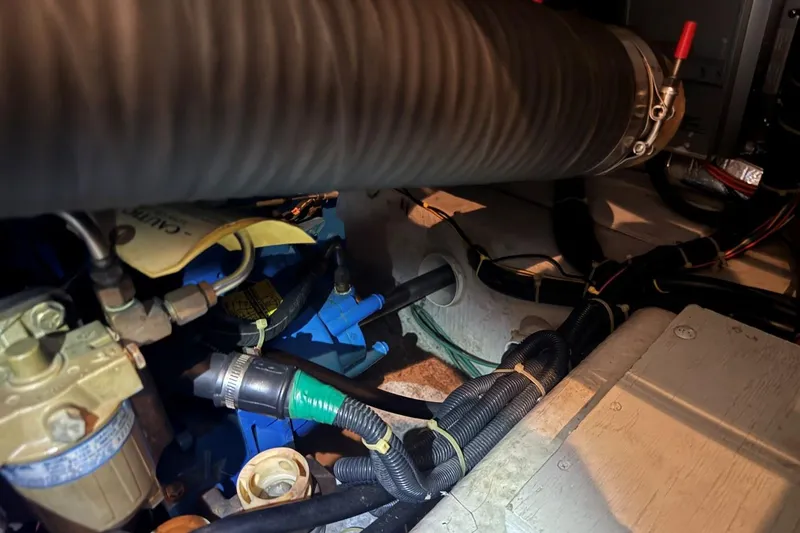  Yacht Photos Pics Engine room of a 1998 Carver 405 Motor Yacht, showing hoses and wiring.