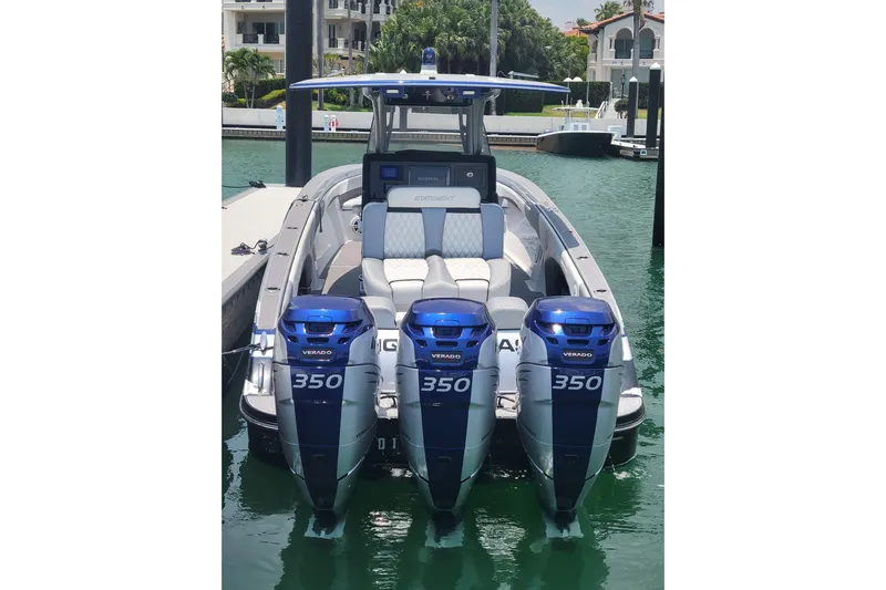  Yacht Photos Pics 2019 Statement 380 Open boat with triple 350 Verado engines docked in marina.