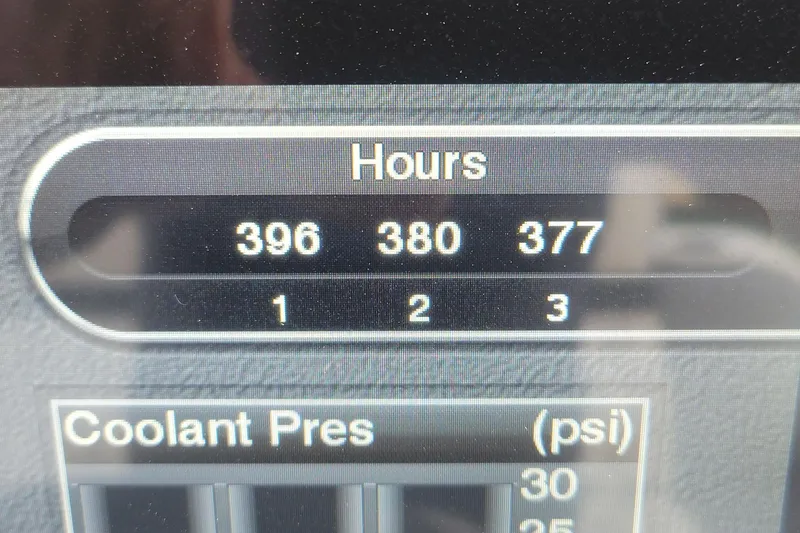  Yacht Photos Pics Display showing engine hours and coolant pressure for 2019 Statement 380 Open.