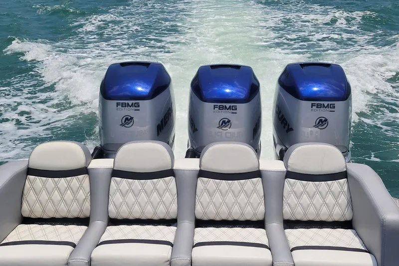  Yacht Photos Pics Luxury boat with triple Mercury outboard engines, Statement 380 Open, 2019 model, cruising on water.