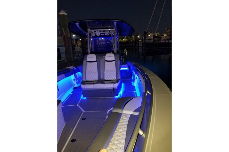  Yacht Photos Pics 2019 Statement 380 Open boat with blue LED lighting at night.
