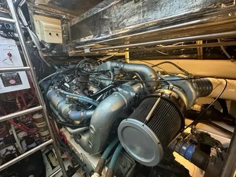Mirabella Yacht Photos Pics Engine room of 1996 Tiara Yachts 43 Open, showcasing complex machinery and components.