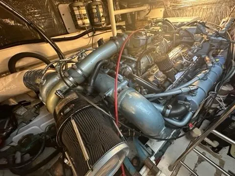 Mirabella Yacht Photos Pics Engine room of a 1996 Tiara Yachts 43 Open, showcasing detailed machinery.