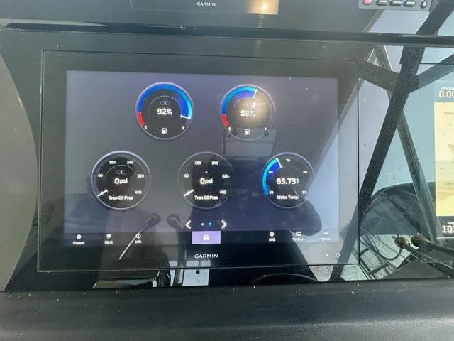 Mirabella Yacht Photos Pics Garmin display on 1996 Tiara Yachts 43 Open showing engine and water tank data.