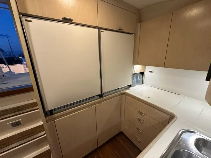 Mirabella Yacht Photos Pics 1996 Tiara Yachts 43 Open kitchen with dual fridges and ample storage.