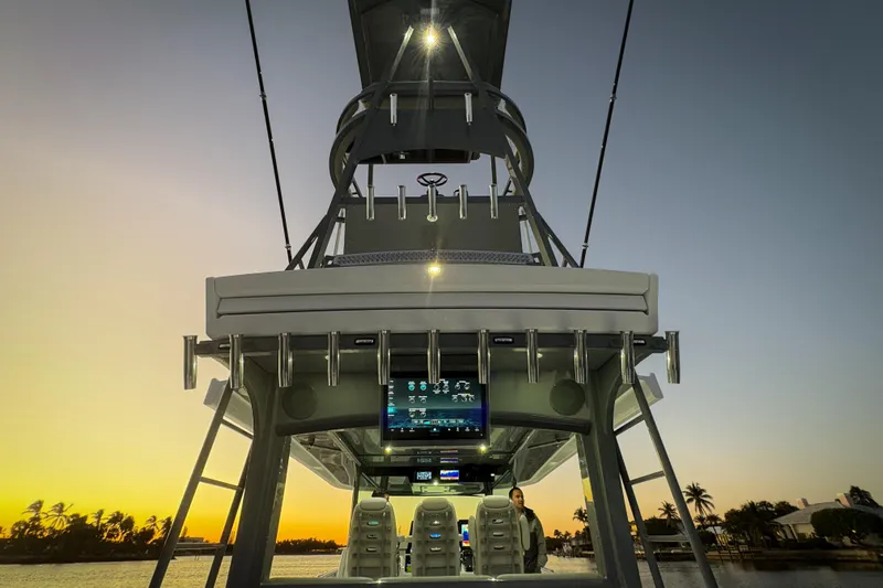  Yacht Photos Pics 2026 HCB 56 Suenos GIX boat at sunset, featuring advanced navigation technology.