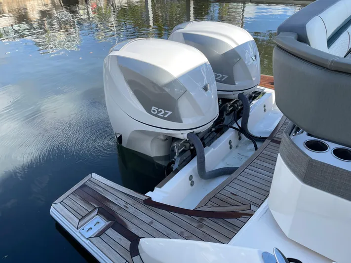  Yacht Photos Pics 2020 Tiara Yachts 38 LS with twin 527 engines docked on water.