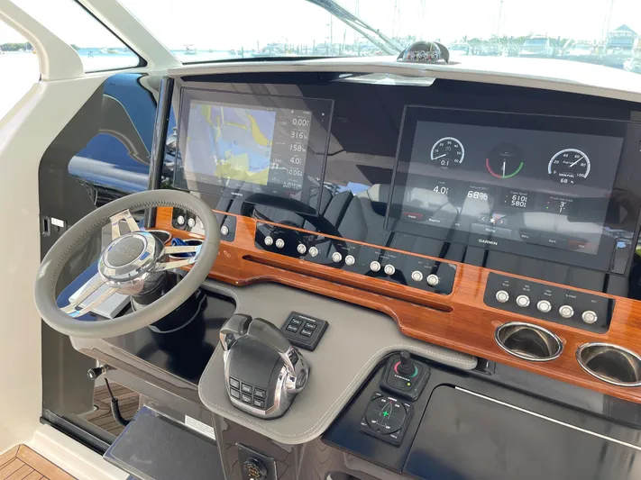  Yacht Photos Pics Helm station of 2020 Tiara Yachts 38 LS with advanced navigation displays.