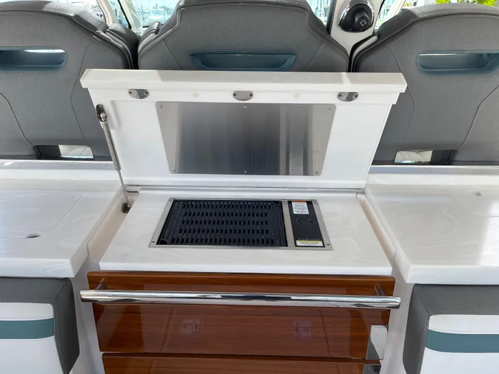  Yacht Photos Pics Outdoor kitchen on a 2020 Tiara Yachts 38 LS with grill and storage.