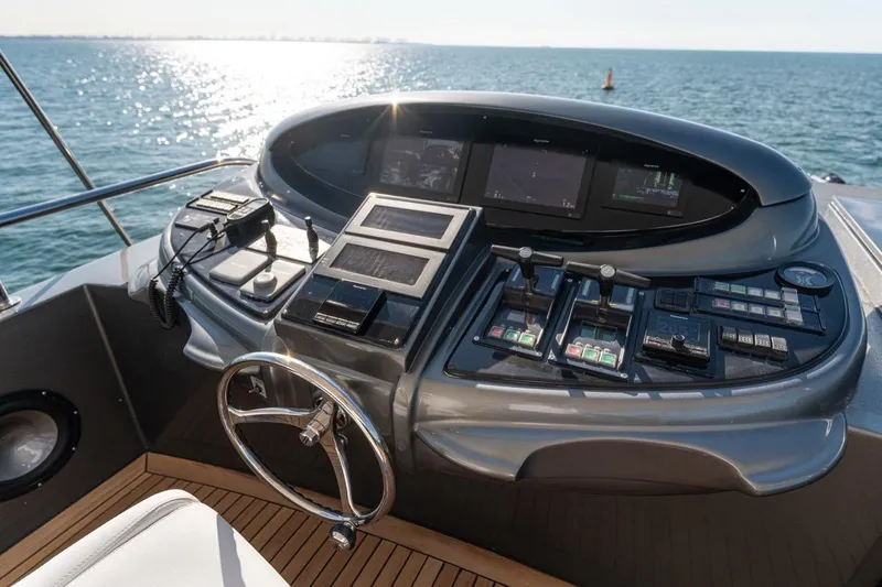 Spectre Yacht Photos Pics Helm of 2004 Azimut 100 Jumbo yacht with ocean view and navigation controls.