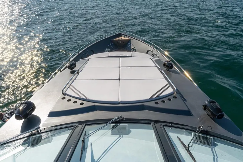 Spectre Yacht Photos Pics Bow view of 2004 Azimut 100 Jumbo yacht on sparkling water.