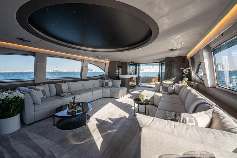 Spectre Yacht Photos Pics Luxurious interior of 2004 Azimut 100 Jumbo yacht with elegant seating and ocean views.