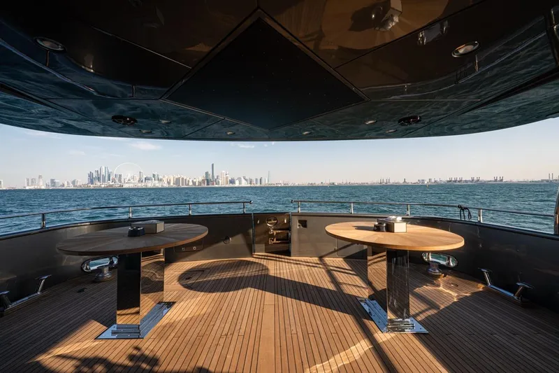 Spectre Yacht Photos Pics Luxurious 2004 Azimut 100 Jumbo yacht deck with city skyline view.