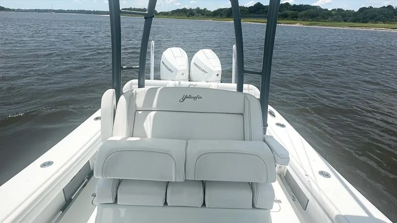  Yacht Photos Pics 2020 Yellowfin 26 Hybrid boat with dual Mercury engines on a calm waterway.