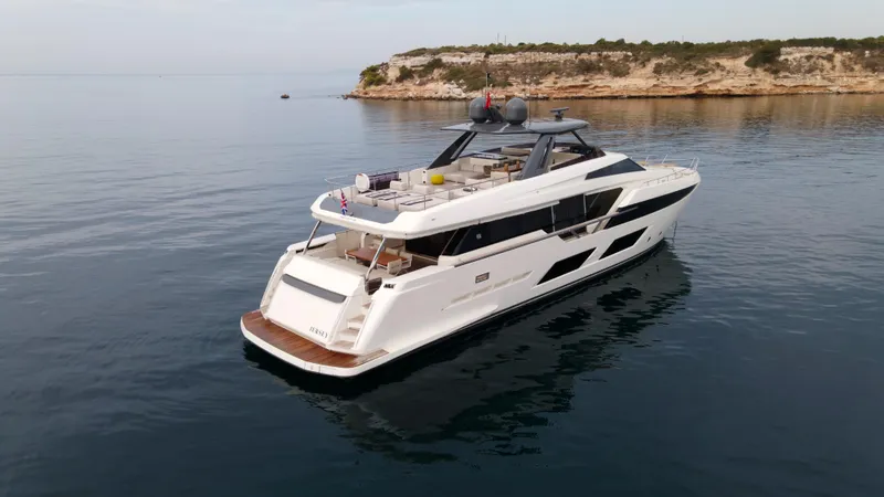 M/y Sunrise Yacht Photos Pics Luxury 2021 Ferretti Yachts 920 cruising on calm waters near rocky coastline.