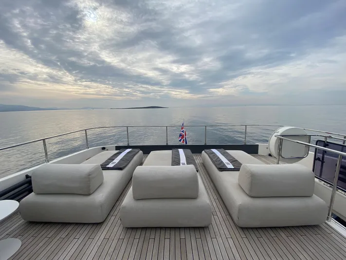 M/y Sunrise Yacht Photos Pics Luxurious 2021 Ferretti Yachts 920 deck with plush seating and ocean view.