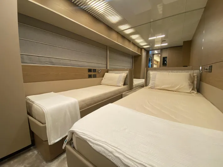 M/y Sunrise Yacht Photos Pics Luxurious twin bedroom in 2021 Ferretti Yachts 920, featuring modern design and cozy ambiance.