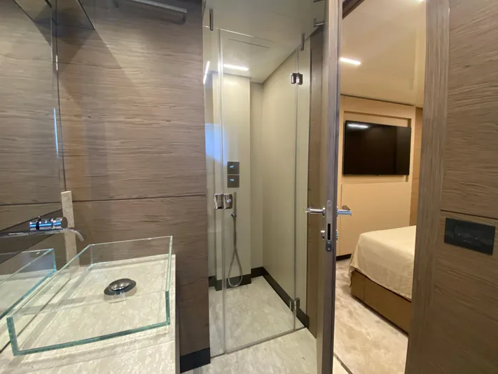 M/y Sunrise Yacht Photos Pics Luxurious bathroom interior on 2021 Ferretti Yachts 920 with glass shower and modern design.