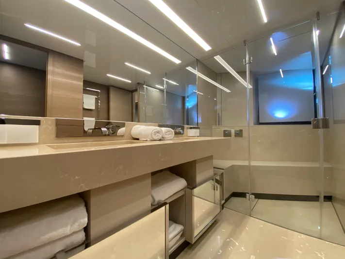 M/y Sunrise Yacht Photos Pics Luxurious bathroom in 2021 Ferretti Yachts 920, featuring modern design and elegant fixtures.