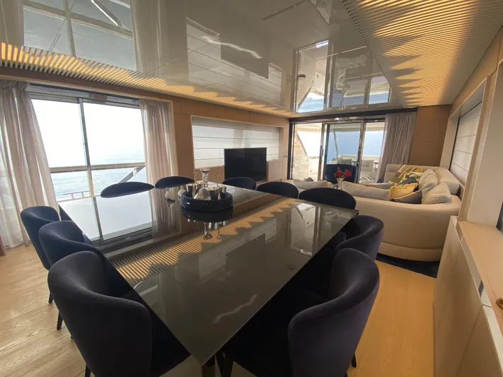 M/y Sunrise Yacht Photos Pics Luxurious interior of 2021 Ferretti Yachts 920 with elegant dining and seating area.