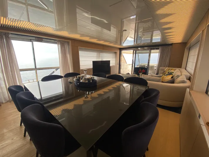 M/y Sunrise Yacht Photos Pics Luxurious interior of 2021 Ferretti Yachts 920 with elegant dining and seating area.