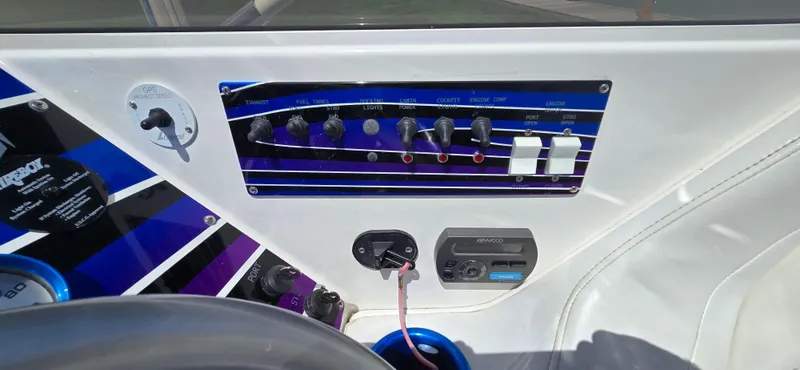  Yacht Photos Pics Control panel of a 2007 Fountain 42 Executioner boat with switches and audio system.