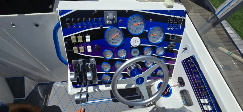  Yacht Photos Pics Dashboard of a 2007 Fountain 42 Executioner boat with gauges and controls.