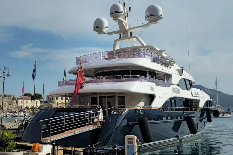  Yacht Photos Pics Luxury Benetti Vision 45m yacht docked, 2010 model, elegant design, marina backdrop.