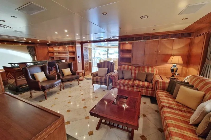  Yacht Photos Pics Luxurious interior of 2010 Benetti Vision 45m yacht with elegant seating and wooden accents.