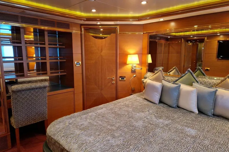  Yacht Photos Pics Luxurious bedroom interior on 2010 Benetti Vision 45m yacht with elegant decor and plush bedding.