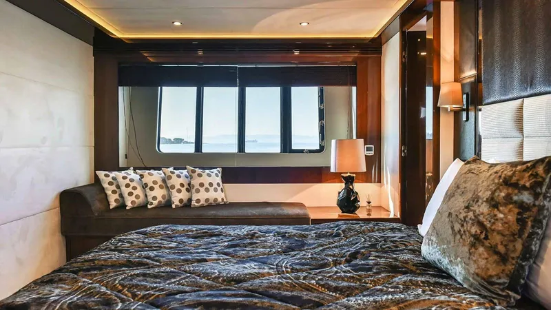  Yacht Photos Pics Luxurious bedroom interior on 2011 Princess V85 yacht with elegant decor and sea view.