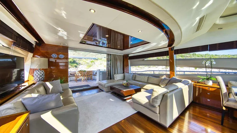  Yacht Photos Pics Luxurious interior of 2011 Princess V85 yacht with elegant seating and panoramic windows.