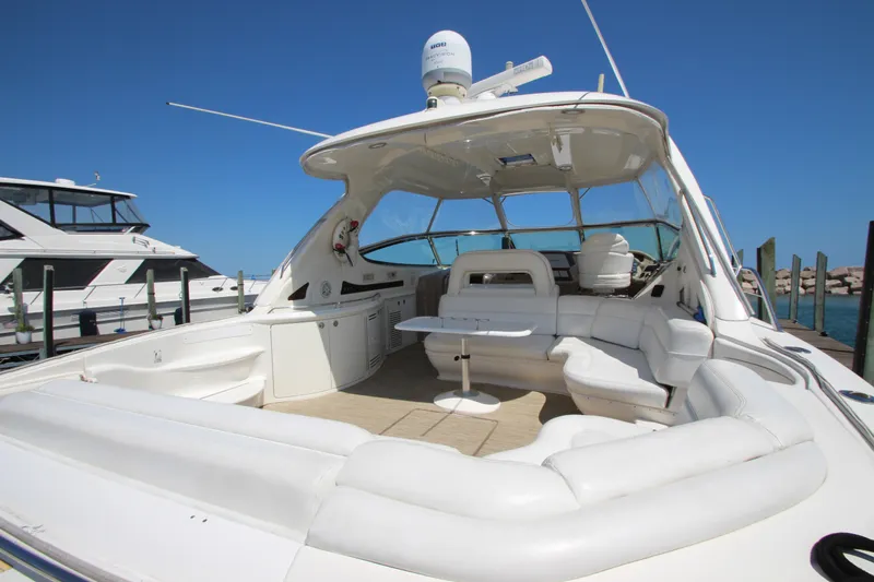  Yacht Photos Pics 2003 Sea Ray 550 Sundancer yacht with spacious white seating and sleek design.