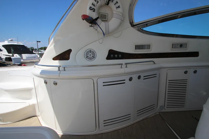  Yacht Photos Pics 2003 Sea Ray 550 Sundancer yacht interior with storage cabinets and sleek design.