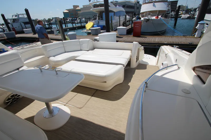  Yacht Photos Pics 2003 Sea Ray 550 Sundancer yacht with spacious deck seating at marina.