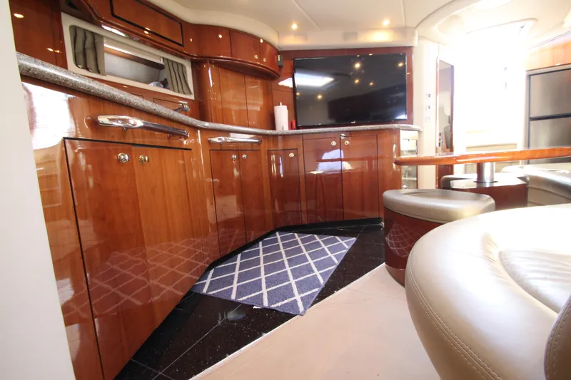  Yacht Photos Pics Luxurious 2003 Sea Ray 550 Sundancer yacht interior with polished wood cabinetry and modern amenities.