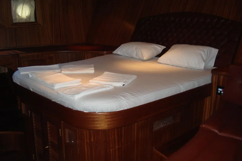 Arinna Yacht Photos Pics Luxurious cabin interior of 2006 Aegean Yacht AEGEAN SAILOR 22.50 with elegant wooden finish.
