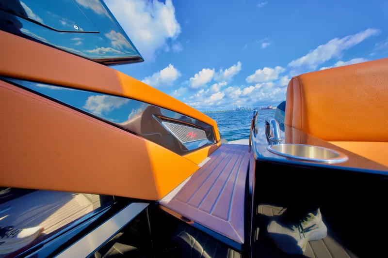  Yacht Photos Pics 2022 Cruisers Yachts 338 South Beach Edition Bow Rider on water, featuring sleek design and luxury seating.