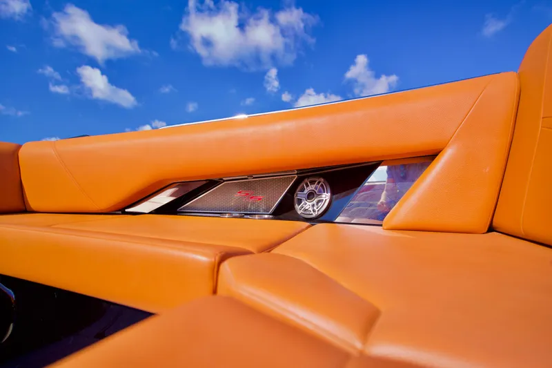  Yacht Photos Pics 2022 Cruisers Yachts 338 South Beach Edition Bow Rider, orange interior, under blue sky.