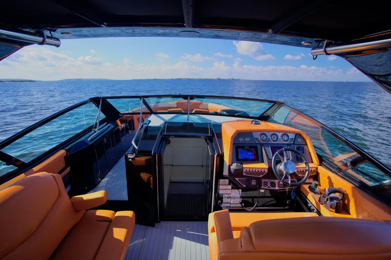  Yacht Photos Pics 2022 Cruisers Yachts 338 South Beach Edition Bow Rider on open water, luxurious interior.