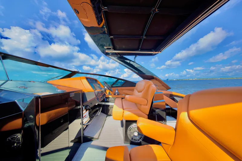 Yacht Photos Pics 2022 Cruisers Yachts 338 South Beach Edition Bow Rider with luxurious orange seating.